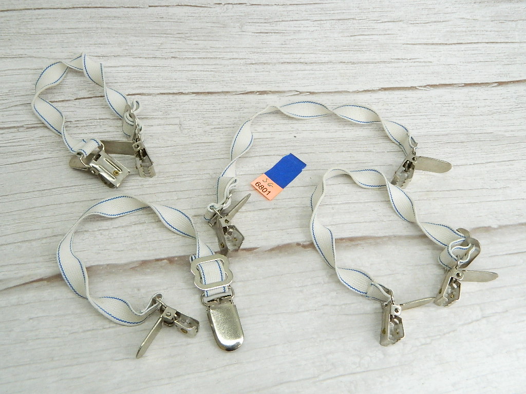 SG6801 Collection of 4 Elastic Clothing Clips Adjustable 11in Long